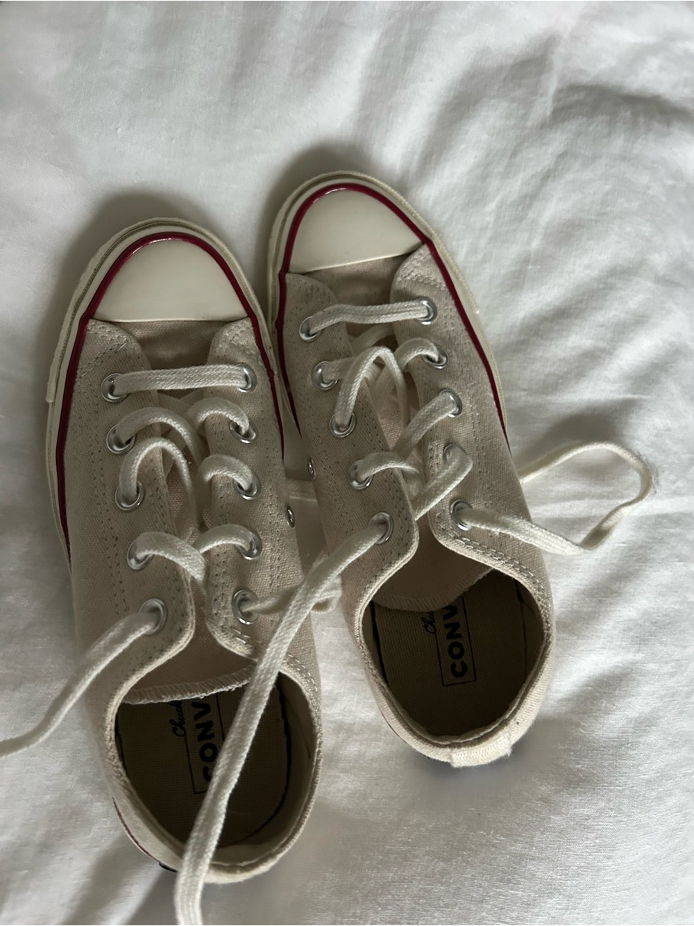 Women’s Canvas Low-Top Chuck Taylor Sneakers in Cream with Red Trim